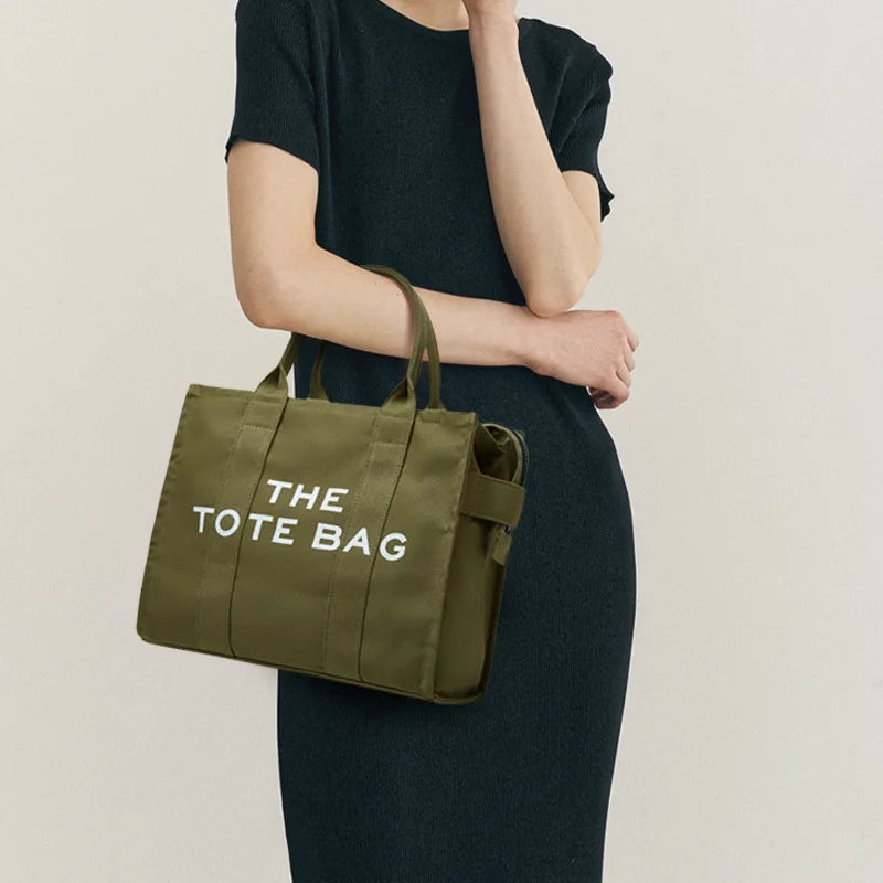 Handheld storage bag, commuting crossbody bag, trendy letter canvas casual shoulder bag, women's bag
